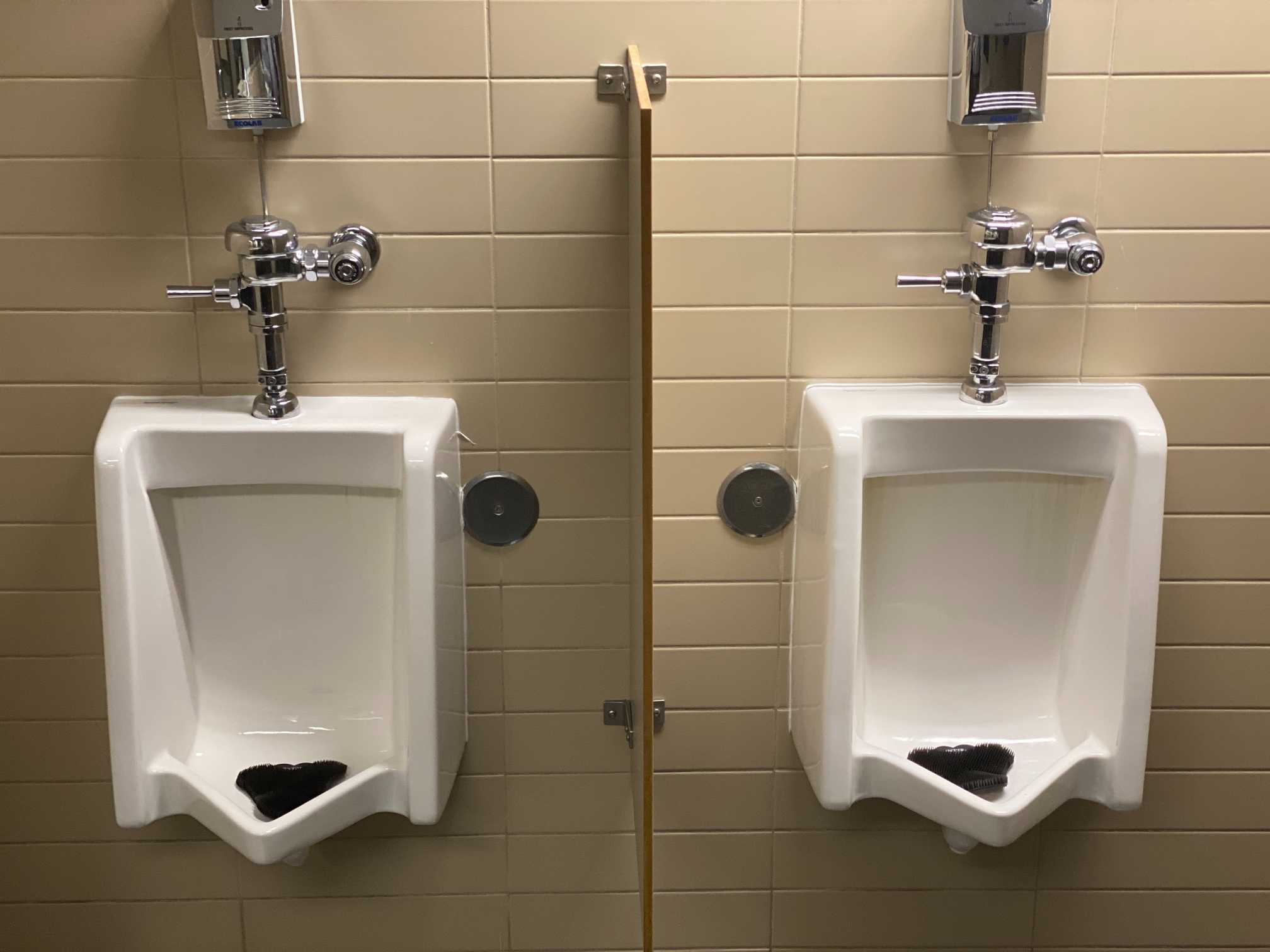 How often should urinal screens be replaced?